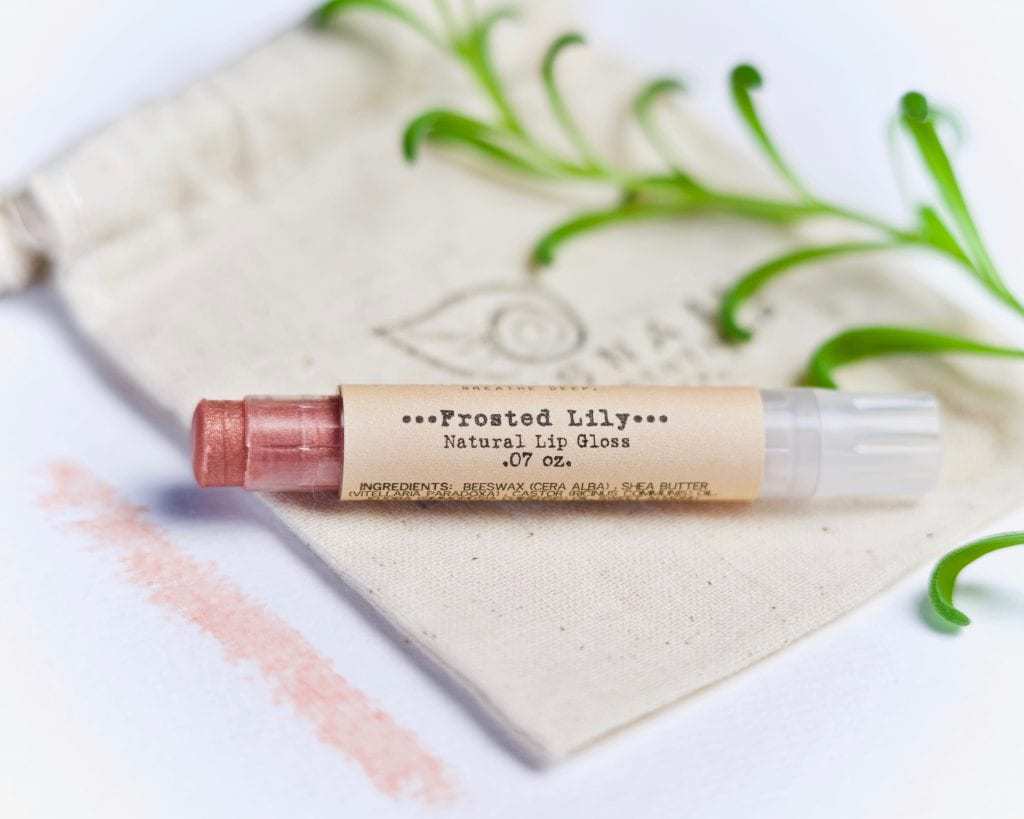 Light pink color you can achieve with the DIY tinted lip balm recipe with mica.