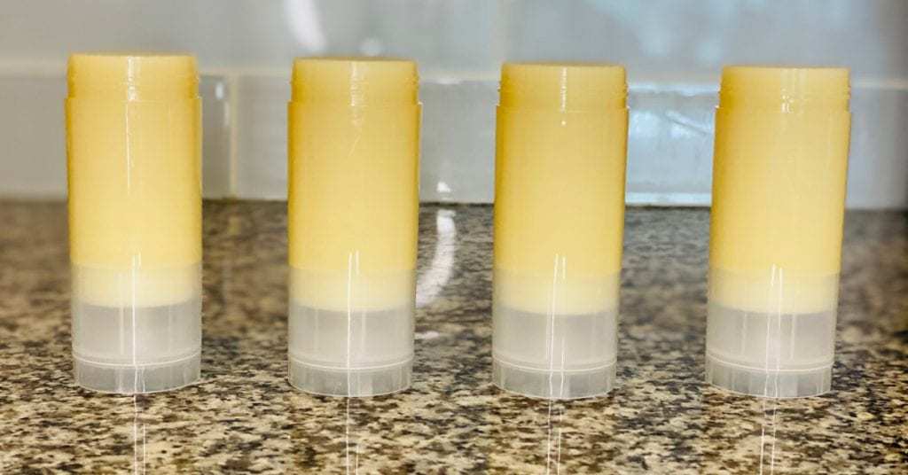 4 lotion bar tubes filled with the belly balm.