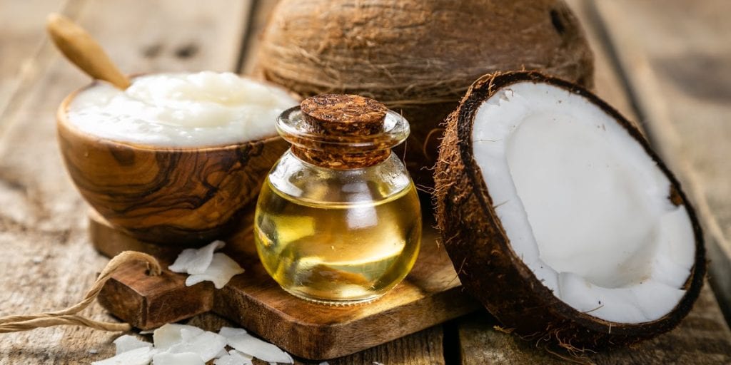 Coconut oil and carrier oil for natural skin care.